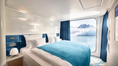 NAT_SPI_Junior Suite_Schlafbereich_©_Hapag_Lloyd_Cruises