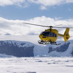 Helicopter_Flying_Antarctica_©_Michelle_Sole_Quark_Expeditions