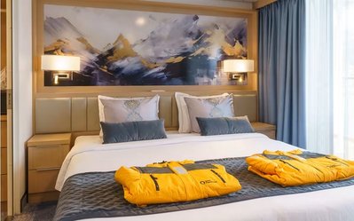 Ocean_Explorer_Penthouse_Suite_Bed__c__Quark_Expeditions