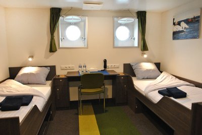 MV_Ortelius_twin_porthole_cabin_deck_4_©_Monica_Salmang_Oceanwide_Expeditions