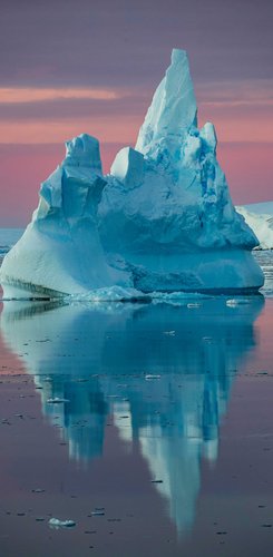 Iceberg_sunset_Antarctica_©_Aurora_Expeditons_Scott_Portelli